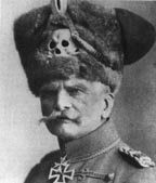 Field Marshal  wearing a hat with the totenkopf insignia