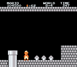 Mario encounters the original Goombas attacking in a group.
