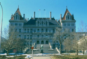New York State Capitol Building, completed in 1899 at a cost of $25 million was the most expensive government building of its time. Three teams of architects labored on it.