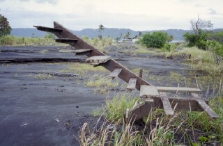 Remains of an internal staircase in Rabaul from the 1994 eruption. Note the depth of the ash.