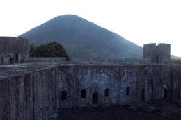 Banda Besar volcano seen from Fort Belgica.Note soldiers at left.