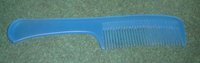 A modern  comb with a handle