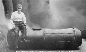 Bobby Leach and his barrel after his trip over Niagara Falls, 1911