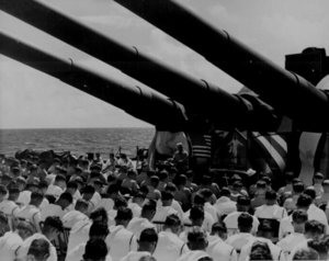 July 1, 1945, Chaplain Lindner reads the benediction held in honor of fellow shipmates killed in the air action off Guam