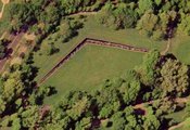 A satellite image of the Wall taken on ,  by the . The dots visible along the length of the angled wall are visitors. For a satellite view of the Wall in relation to other monuments, see .