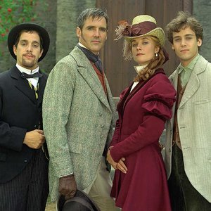 Left to right: Michel Courtemanche as Passepartout, Michael Praed as Phileas Fogg, Francesca Hunt as Rebecca Fogg, and Chris Demetral as Jules Verne.
