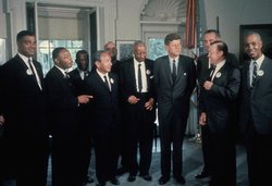  in the  with various civil rights activists including Martin Luther King (second from left).