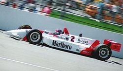 Emerson Fittipaldi racing in the  in .