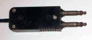 An obsolete six conductor, two pin jack plug