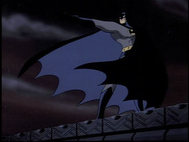 The animated Batman shoots his grappling gun from a rooftop in a scene from the episode, "On Leather Wings".
