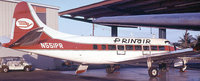 Prinair de Havilland Heron at San Juan-Luis Munoz airport, Puerto Rico. Photograph taken July 1972.