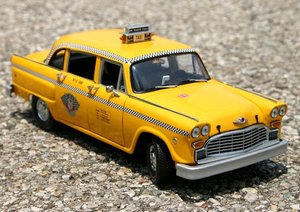 Metal die-cast model of a Checker taxicab