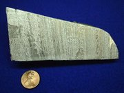 Aluminium metal with an American  for size comparison