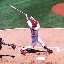 Mark McGwire hits a home run during his last Major League season in 2001.