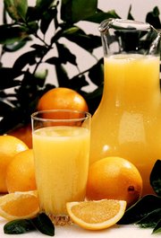 Orange juice is sometimes naturally colored to match the color of orange rinds.