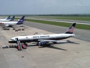 A North American Airlines Boeing 757 parked at the Rafael Hernndez Airport, with Fed Ex and Tradewinds jets nearby. Photo copyrighted by, and courtesy of, Jose Mendez and the BQN Ramp Spotters.