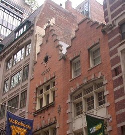 Dutch Revival buildings from the early  on Pearl Street in lower  recall the Dutch origins of the city. The original 17th century architecture of New Amsterdam has completely vanished, leaving only archaeological remnants