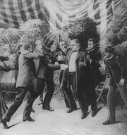 Leon Czolgosz shoots President McKinley with a concealed revolver, at the Pan-American Exposition.