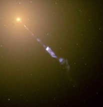 The  emitted by M87 in this image is thought to be caused by a supermassive  at the galaxy's center.