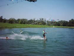  is a similar sport, combining water skiing and surfing