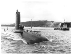 HMS Conqueror returning to  after the war, flying the  to signal her sinking of the 