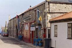 This photo shows the place, in a street about 50m from Seahouses harbour, where the kipper "accident" in 1843 is said to have occurred.