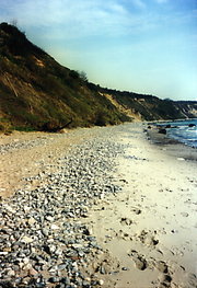 Pebble beach made up of flint nodules eroded out of the nearby  cliffs, , 
