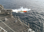 A Mark-32 Mod 15 Surface Vessel Torpedo Tube (SVTT) fires a Mark-46 Mod 5 lightweight torpedo.