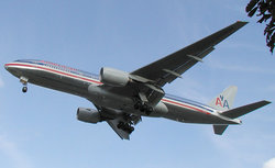  Boeing 777. An identification aid is the six wheels on each landing gear.