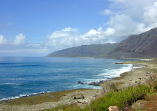 Ka'ena Point in far distance is the western tip of O'ahu,seen here from Kaneana on the south shore near Mākua Cave
