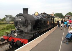 Bishops Lydeard station on the West Somerset Railway, Somerset, England. The locomotive is an ex-Great Western 2-8-0T Tank (number 5224)