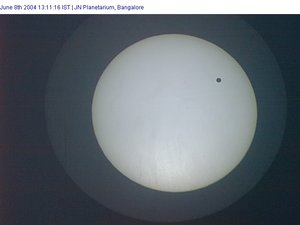 2004 transit as seen from  at 07:41 UTC, about two hours into the transit. The image is inverted compared to the diagram above, so Venus is seen near the top of the Sun's disc.