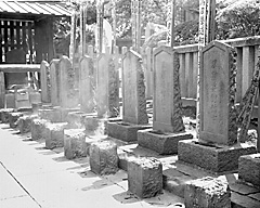 Incense burns at the burial graves of the 47 Ronin at Sengakuji.
