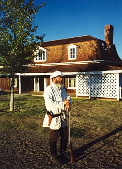Commanding officer's house and reenactor playing General Crook