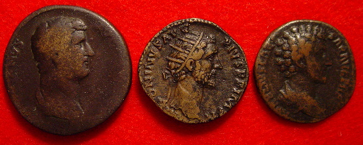 Sestertius of , dupondius of , and as of 