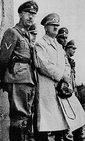  (left) chief of the SS (responsible for rounding up Jews), with  (right), during 