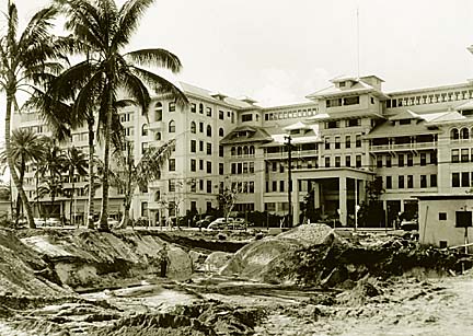 In 1955, Matson Navigation Company tore up the 'Āinahau estate for the development of the Princess Kaiulani Hotel. Pictured in the background is the Moana Hotel