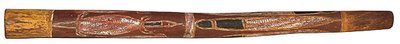 This is an old and authentic didgeridoo collected in  in the  of Australia in the . It has been painted in earth  called  and the designs represent important totemic entities such as the  and snake.