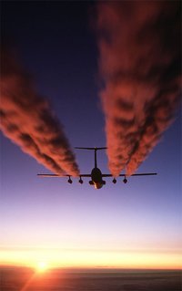 A C-141 Starlifter leaves an exhaust trail over Antarctica