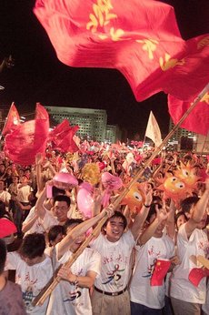 Chinese students celebrated on July 13, 2001 at Millennium Monument upon the announcement that Beijing would host the 2008 Summer Olympics.