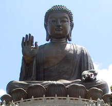 Statues of Buddha such as this, the  statue in , remind followers to practice right living.