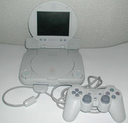 PSone with  screen and a  controller