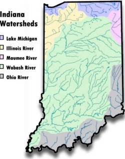 In the above map, The largest area, shaded in green, drains into the . Of the other watersheds, the blue areas drain into , the yellow area drains into the , the pink area drains in to the , the gray area drains into the .
