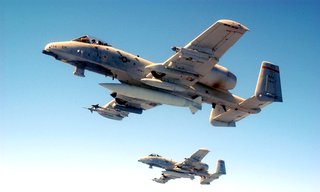 Two A-10 Thunderbolts in flight