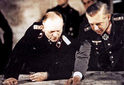 General Guderian with General  at a war conference. (Guderian is wearing a black  uniform.)