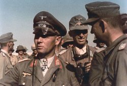 German General Rommel (facing left) 1941, was defeated in spite of his military brilliance