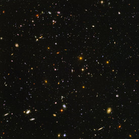 This snapshot of the HUDF includes galaxies of various ages, sizes, shapes, and colors. The smallest, reddest galaxies, about 100, may be among the most distant known, existing when the universe was just 800 million years old.