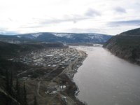 Aerial view of Dawson City with the Yukon river in early May