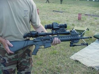 An SPR with a full M16 riflestock and various night vision optics attached.