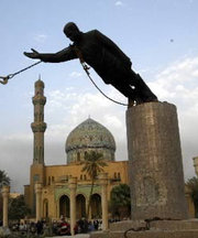 U.S. troops topple a giant statue of Saddam in Baghdad, following the capture of the city in April.